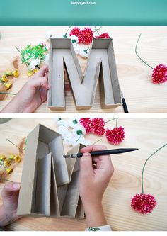 the letter m is made out of cardboard with flowers in it and cut into smaller pieces