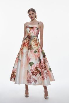 Revitalise your formalwear collection in this joy-infused floral dress. An elegant photographic floral print lends romantic allure to this piece, while a flared maxi dress add a dramatic mood. Style this dress with a pointed heels and accessories for an unforgettable evening look.Photographic floral printCami strapsA-line skirtMaxi hemlineFrom wedding guest dresses to mother of the bride outfits, discover our new season formalwear collection. Elegant A-line Evening Dress With Floral Print, Elegant A-line Floral Evening Dress, Floral Print A-line Midi Dress For Wedding Guest, Feminine A-line Midi Dress For Prom, Evening Floral Print Midi Dress, Feminine Floral Maxi Dress For Party, Elegant Floral Print A-line Dress, Spring Tea-length Evening Dress With Fitted Bodice, Tea-length Floral Print Cocktail Dress