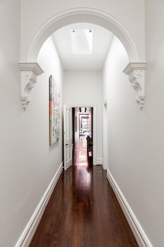 the hallway is clean and ready for us to use it as an entrance way in this house