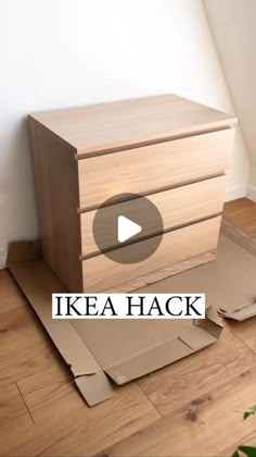 a wooden dresser sitting on top of a hard wood floor