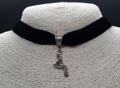 This choker is made from black velvet and can be adjusted to fit with a 5 cm chain and lobster claw fastening. It has a super cute detailed Tibetan silver witch hat charm with an even cuter little pumpkin dangling from the brim! This necklace is perfect for Spooky Season as well as all year around. Halloween doesn't have to be just one day. Gothic Pendant, Black Velvet Choker, Bone Necklace, Velvet Choker, Skull And Bones, Choker Necklaces, Bow Hair Clips, Witch Hat, Hair Barrettes