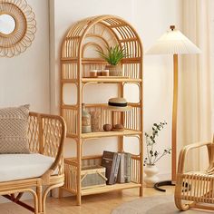 a living room with wicker furniture and a white rug on the floor in front of a window