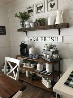 a farm fresh sign on the wall above a table with two chairs and a coffee maker