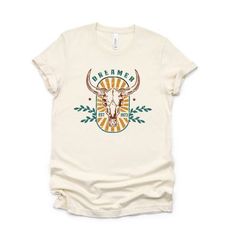 This trendy Bella Canvas short sleeve unisex graphic tee from Simply Sage Market is sure to make a great addition to any wardrobe. We recommend ordering your regular t-shirt size. Please see the size chart. Short Sleeve Tractor Supply, Cow Skull, Shirt Outfit, Tractor, Shirt Shop, The Dreamers, Bella Canvas, Graphic Tee, Graphic T Shirt