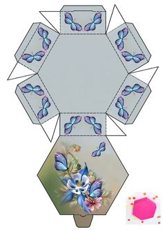 an origami box with flowers and butterflies on the side, cut out from paper