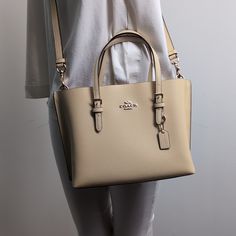 100% Authentic Or Money Back Guarantee !!! Coach C4084 Mollie Tote 25 Double Face Leather Crossbody Gold/Vanilla Zip-Top Closure, Fabric Lining Side Open Compartments Handles With 4 3/4" Drop Detachable Strap With 22" Drop For Shoulder Or Crossbody Wear 9 3/4" (L) X 7 1/2" (H) X 4 3/4" (W) Style No. C4084 Coach Mollie Tote 25, Coach Mollie, Vanilla Color, Drawstring Bucket Bag, Bags Coach, Coach Outlet, Coach Crossbody, Coach Crossbody Bag, Crossbody Messenger Bag