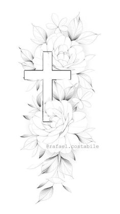 a cross with flowers and leaves around it