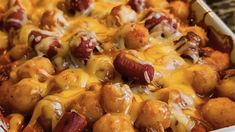 a casserole dish with sausage and cheese