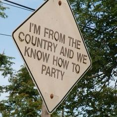 a sign that says i'm from the country and we know how to party