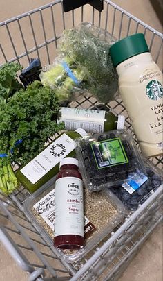 a shopping cart filled with lots of food and condiments to make it easier for people to eat