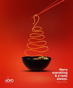 a bowl with noodles and chopsticks in it on a red background that says merry everything & a tasty always