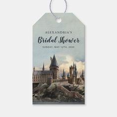 a harry potter themed bridal shower tag with hogwarts castle in the background