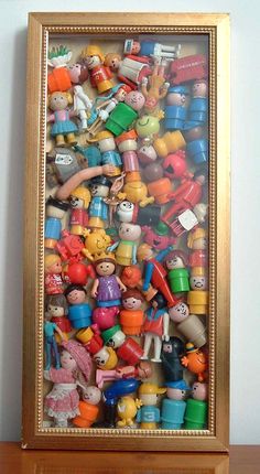 there is a framed picture with many toys in it