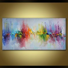 an abstract painting with bright colors and lines on the bottom, is displayed in front of a