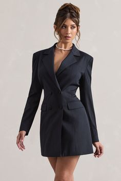 Take business casual to new heights with our premium blazer dress, State Of Mind. Crafted in a deep navy hue of our premium pinstripe, this tailored mini features subtle shoulder padding, peak lapels and a self-tie back for a cinched custom fit. For a sophisticated ensemble, pair yours with a simple pearl necklace and tousled bun.  Features - Premium pinstripe- Tailored fit - Peak lapels- Shoulder padding- Double breasted- Self-tie back- Mini length Sizing & Fit Model is 5'7 and wears UK size 8 / US size 4Product Information Designed exclusively by Club L London Lined with some stretch Premium woven fabric in Navy Pinstripe (67% Polyester, 30% Viscose, 3% Elastane)SKU: CL132312015 Simple Pearl Necklace, Blazer Mini Dress, Simple Pearl, Black Tie Gala, Party Dress Long Sleeve, Bridesmaid Outfit, Black Sequin Dress, Tailored Blazer, Party Dress Long