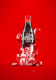 a coca - cola bottle sitting on top of a pile of candy canes and confetti