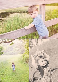 two children are standing on the grass near a fence