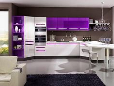 a modern kitchen with purple and white accents