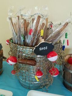 a basket filled with lots of food sitting on top of a blue cloth covered table