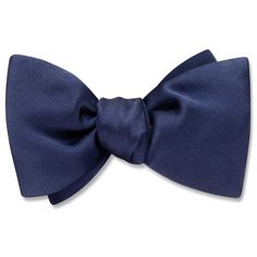 The quintessential formal silk tie in lustrous navy blue.Handcrafted in Middlebury, Vermont. Dapper Blue Bow For Black Tie Events, Classic Blue Bow Tie, Classic Pre-tied Satin Bow Tie, Classic Solid Color Bow With Ties, Elegant Solid Color Bow With Tie Back, Elegant Solid Color Bow For Wedding, Blue Bow Tie Back For Business, Blue Bow Ties For Business, Classic Blue Bow Tie And Suit Accessories