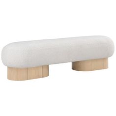 a white bench sitting on top of a wooden stand