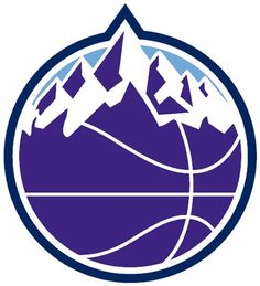 a basketball ball with mountains in the background and snow capped peaks on it's top