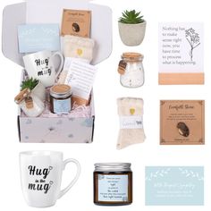 the gift box includes mugs, candles, and other personalized items for someone's special occasion