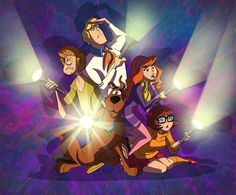 scooby and friends on stage with spotlights