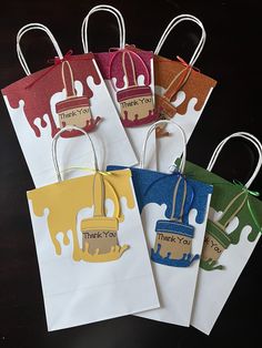 six small bags with thank you tags on them