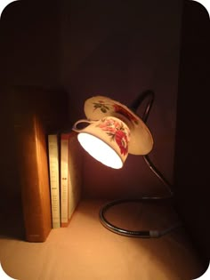 a lamp that is on top of a book