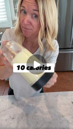 a woman is pouring something into a blender with the words 10 calories on it