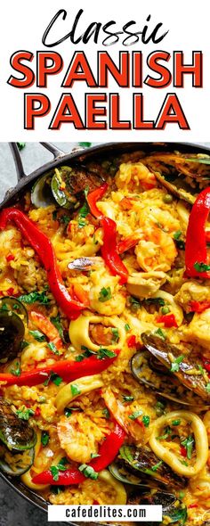 spanish paella in a skillet with red peppers and clams on the side