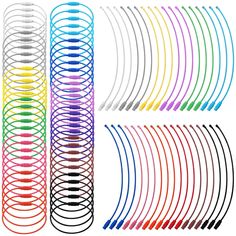 a bunch of different colored spirals on a white background