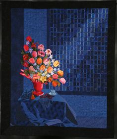 a painting of flowers in a red vase on a blue table cloth with black border