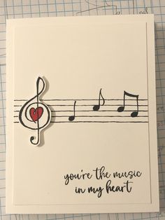 a card with music notes on it and a heart in the middle that says, you're the music on my heart