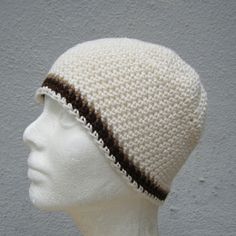 "I hand crocheted this beanie with lightweight off-white cotton/linen blend yarn and accented it with stripes of brown and beige cotton...it is made for those of you who prefer their beanies short, measuring only 7 1/2\" long and just about covering your ears- this hat will fit (or stretch to fit) most average size heads (21\"- 23\" in circumference)- please contact me if you would like a custom size. 7 1/2\"= 19.05 centimeters long 21\"-23\"= 53.34- 58.42 centimeters in circumference this beani Cream Knitted Beanie, Cream Knitted Cotton Hat, Cream Knitted Beanie Made From Yarn, Casual White Crochet Cotton Hat, White Knitted Yarn Beanie, Cream Yarn Beanie, Beige Crochet Hat One Size Fits Most, Beige Yarn Crochet Hat, Handmade White Cotton Crochet Hat