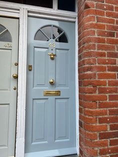 the front door is painted light blue