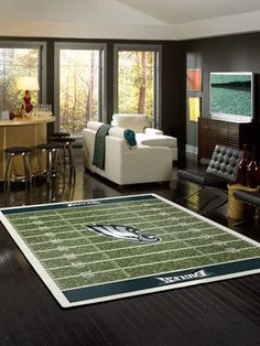 a football field rug in the middle of a living room