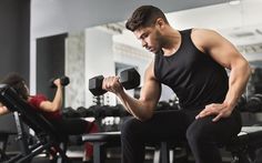 a man and woman working out in the gym