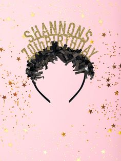 a pink background with gold stars and the words shannows on it's head