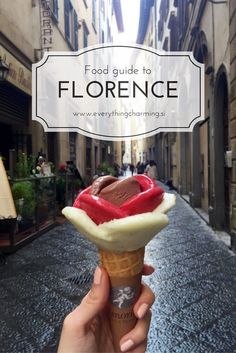 a person holding an ice cream cone in their hand with the words, food guide to florence