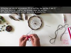 a person is working on some kind of crafting project with scissors and yarns