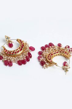 Product Features: Color: Red, White, Gold Base Metal: Sterling Silver Work: Kundan, Pearls, Natural Stones, Faux Ruby Plating Material: Gold Plated Closure Type: Stopper Adjustable: No Earring Size: Length 8.5 CM x Width 6.5 CM Package Content: 1 Pair Earring Occasion: Partywear Disclaimer: There will be slight difference in digital to actual image Ruby Bridal Earrings For Party, Red Hoop Jewelry For Festive Occasions, Red Ruby Bridal Earrings For Festive Occasions, Red Bridal Earrings For Festive Party, Red Bridal Earrings For Party, Festive Red Ruby Bridal Earrings, Festive Red Hoop Jewelry, Festive Red Bridal Earrings For Party, Red Chandbali Danglers For Celebration