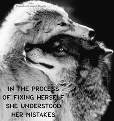 two wolfs with the words in the process of fixing herself