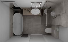 a small bathroom with a toilet, sink and shower head mounted on the wall above it