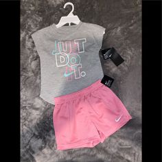 Host Pick Nike Shirt And Shorts Outfit/ Brand New With Tags /How Cute Is This Nike Shirt With Matching Shorts Can Be Worn Together Or Mix And Match With Other Nike Pieces ,Your Little One Will Look So Cute And Be Comfy All At The Same Time Would Also Make An Amazing Gift Pink Short Athleisure Top, Nike Sporty Sports Sets, Sporty Short Pink Tops, Cute Pink Sports Tops, Short Pink Sports Top, Pink Short Tops For Sports, Pink Short Tops For Workout, Pink Short Top For Playwear, Short Pink Tops For Playwear