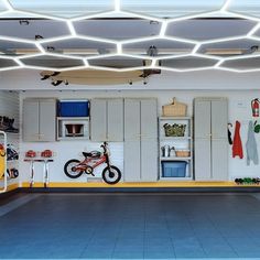 a garage with lots of storage space and various items on the wall, including bicycles