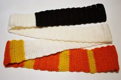 three crocheted headbands laying on top of each other