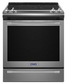 a stainless steel stove with the oven door open