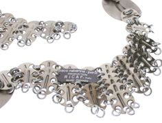 Paco rabanne neclace How To Style A Chain Belt, Metallic Chain Belt With Silver Links, Silver Chain Accessory, Trendy Accessories For Fall, Vintage Metal Belt, Paco Rabanne Jewelry, Paco Rabanne Retro Futurism, Paco Rabanne Necklace, Paco Rabanne Metal Dress